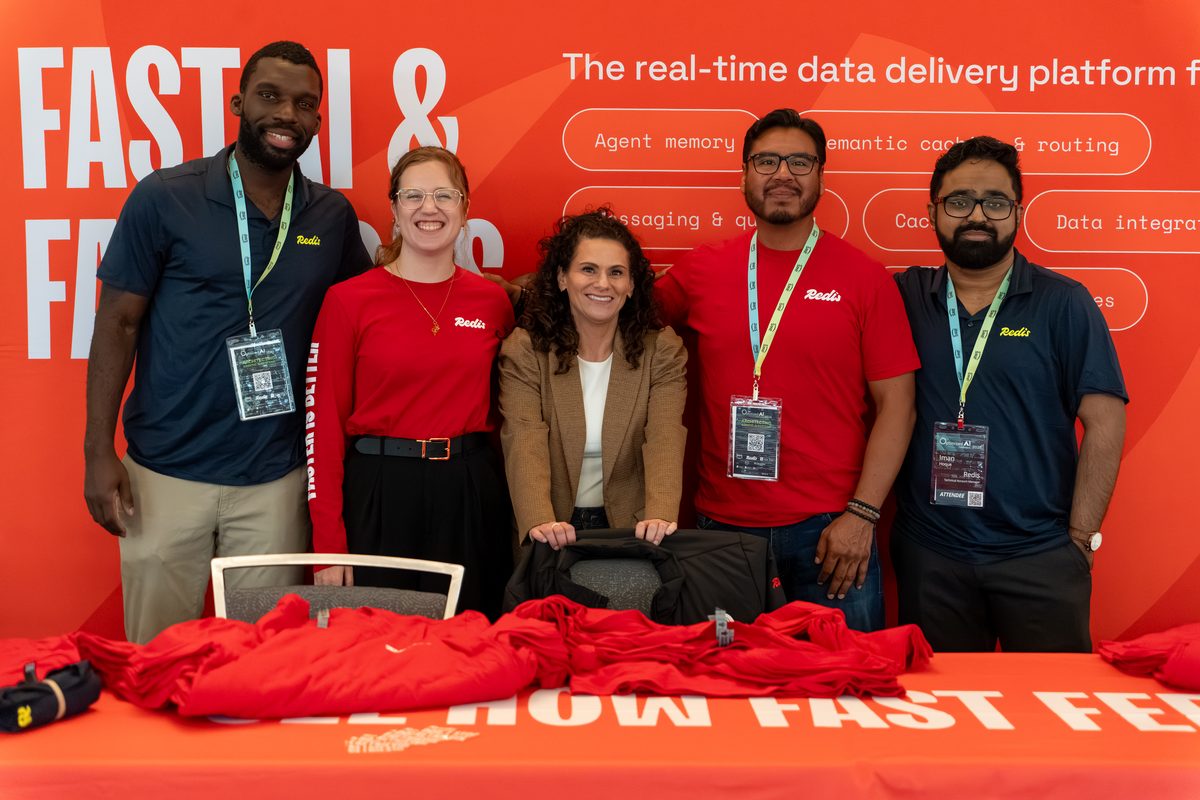 The Redis team at their sponsor booth