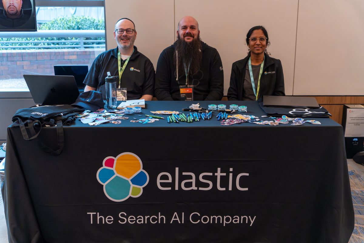 The Elastic team at their sponsor table