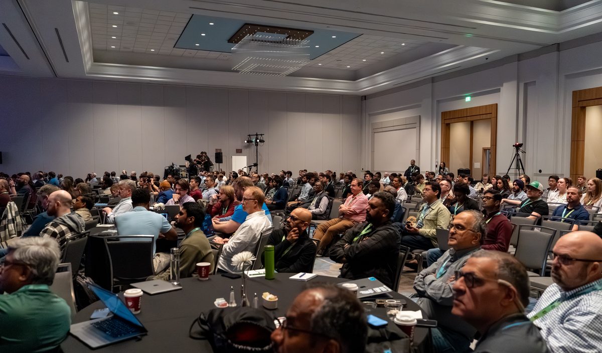 A ballroom full of attendees following a keynote