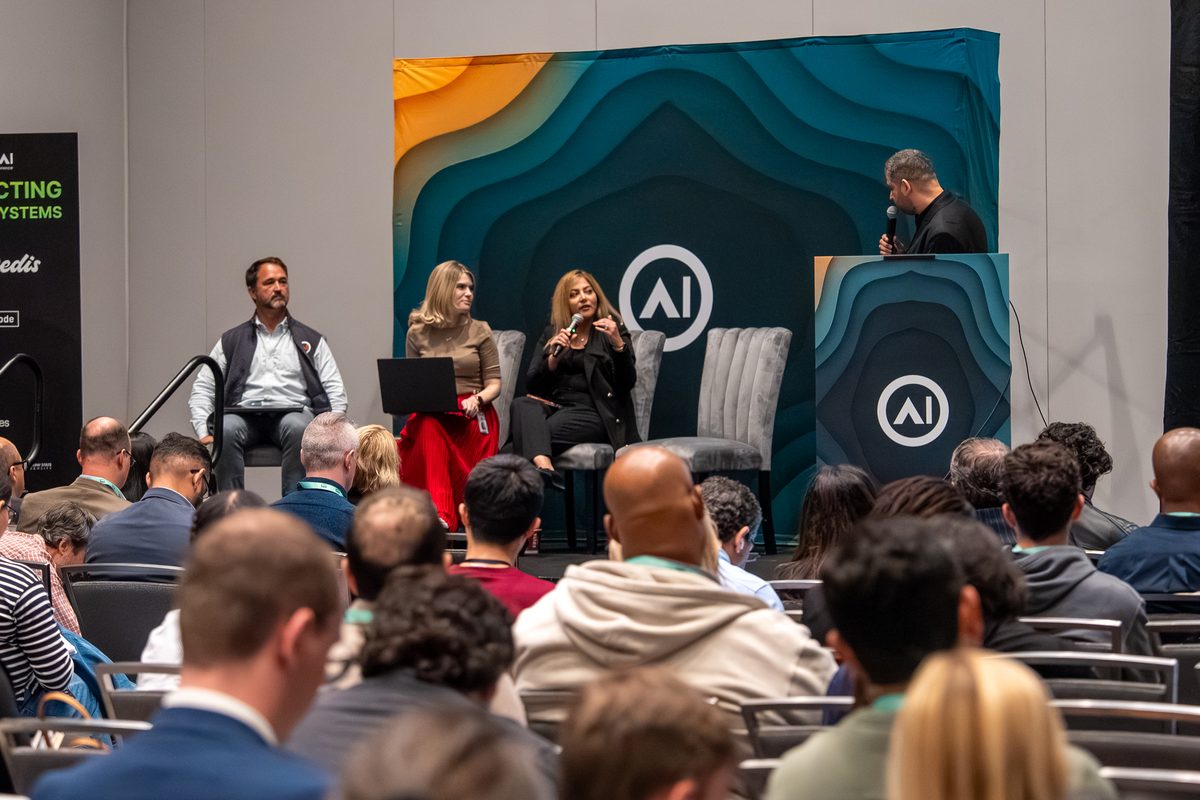 A moderated panel in a breakout room with the audience in front