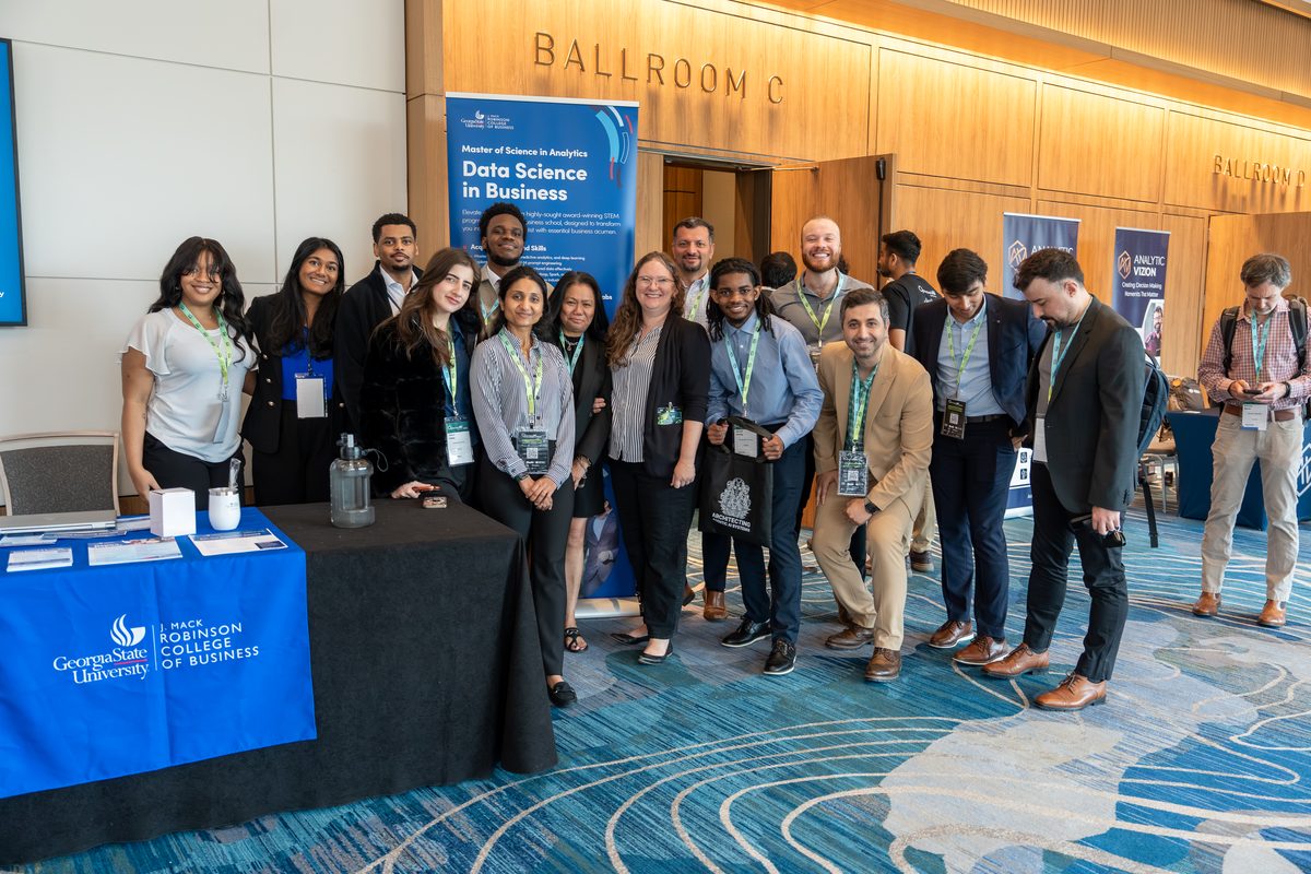 The Georgia State University Robinson College of Business team at their booth