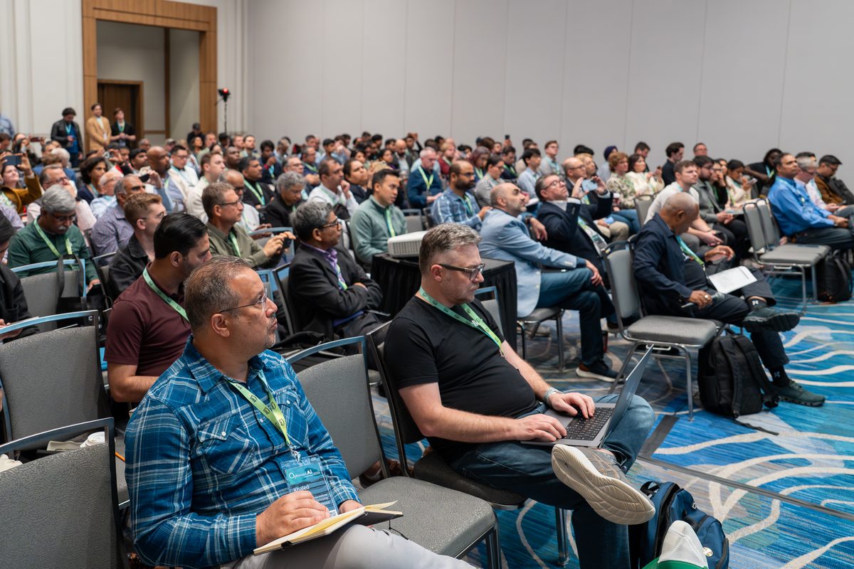 Attendees listening closely in a breakout session